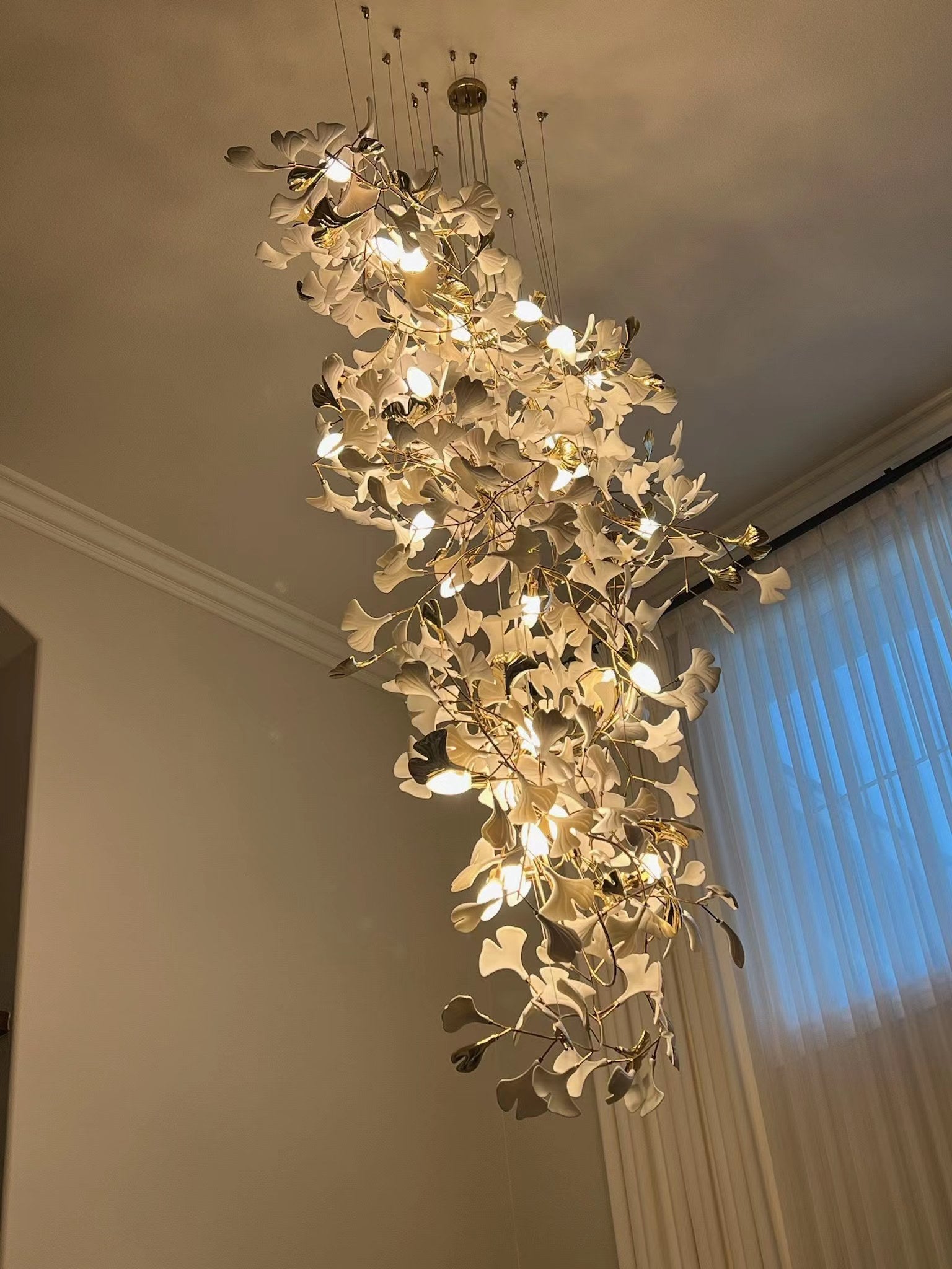 Artistic Tree Branch Pendant Light with Ceramic Ginkgo Leaves for High Ceilings in Hotel or Home