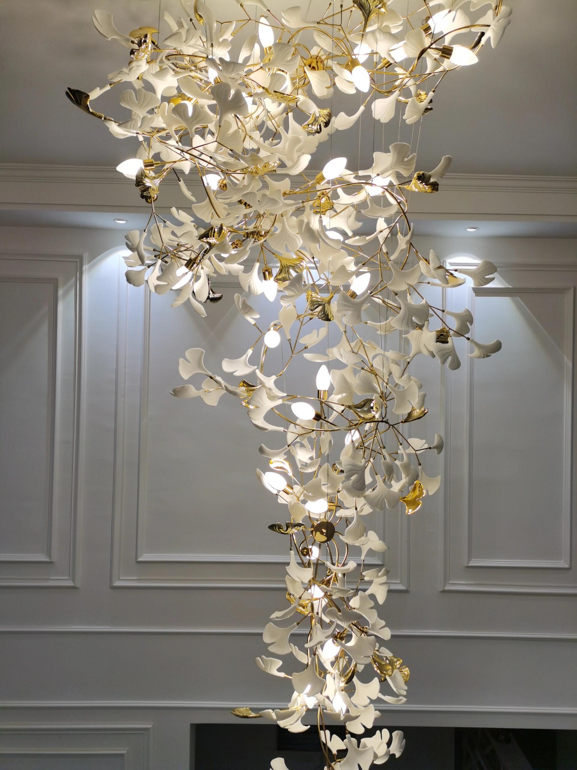 Artistic Tree Branch Pendant Light with Ceramic Ginkgo Leaves for High Ceilings in Hotel or Home