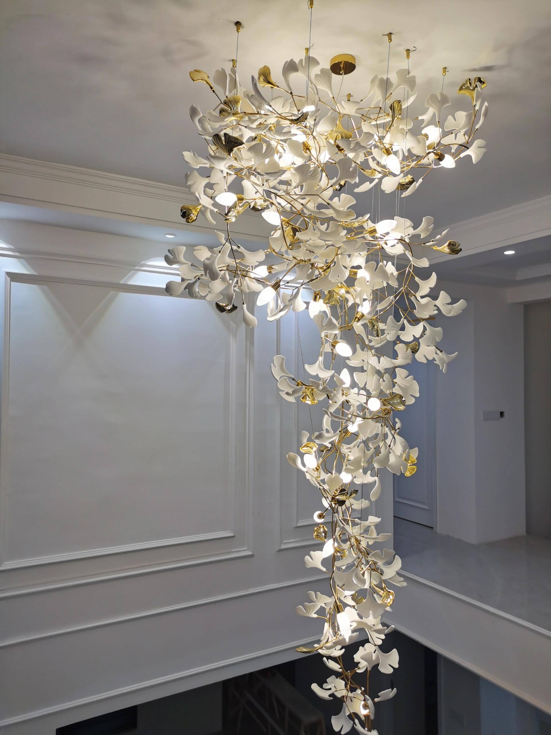 Artistic Tree Branch Pendant Light with Ceramic Ginkgo Leaves for High Ceilings in Hotel or Home