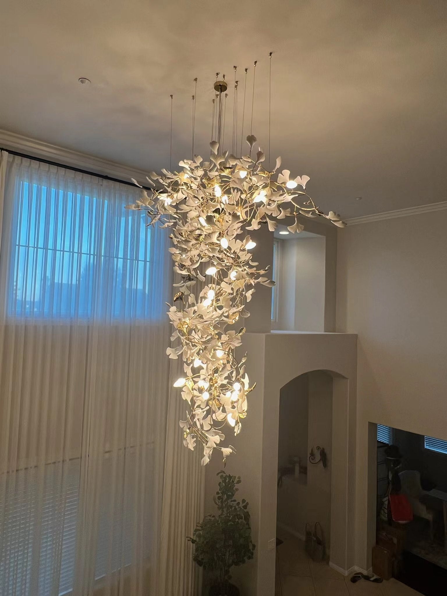 Artistic Tree Branch Pendant Light with Ceramic Ginkgo Leaves for High Ceilings in Hotel or Home