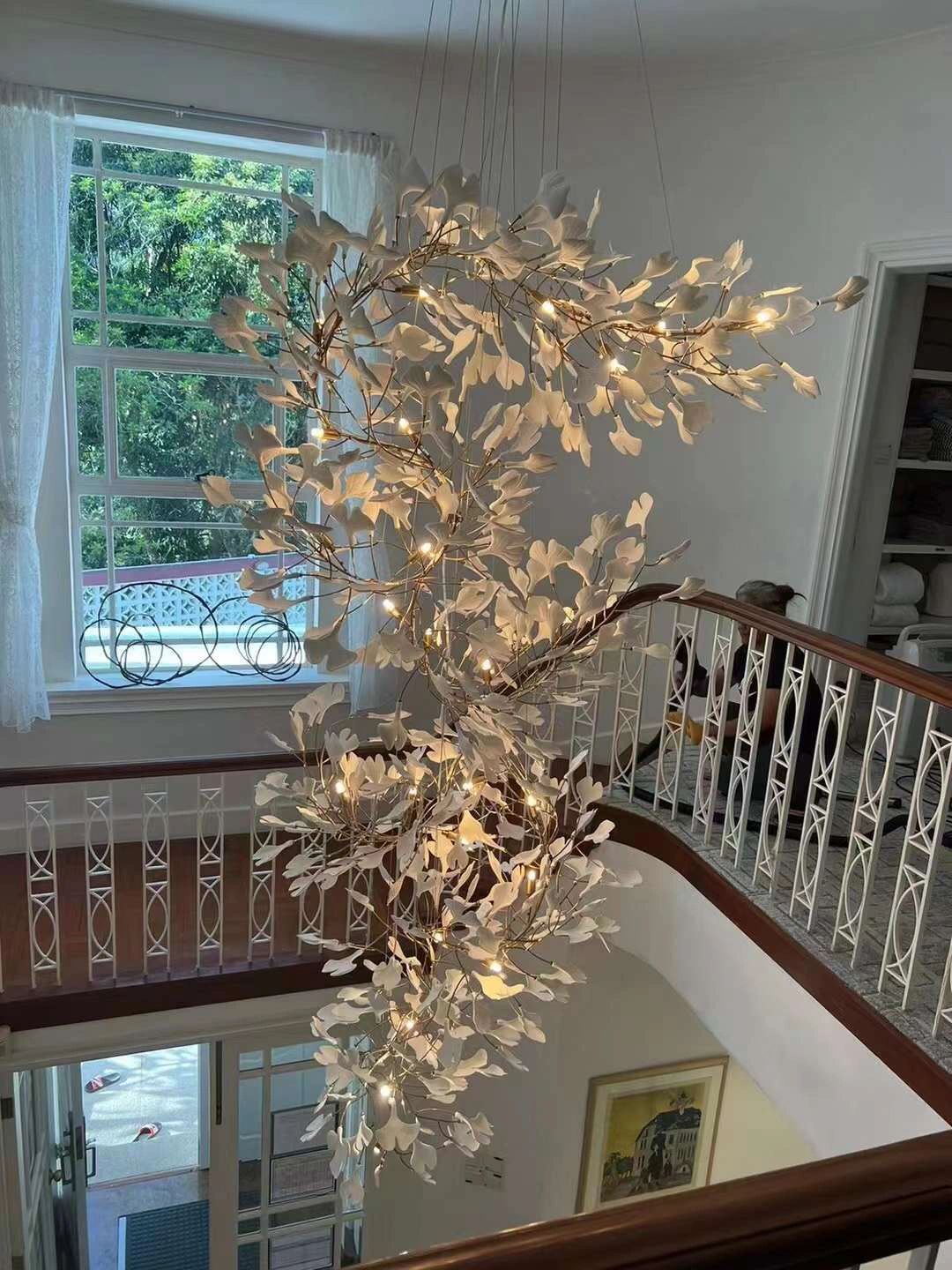 Artistic Tree Branch Pendant Light with Ceramic Ginkgo Leaves for High Ceilings in Hotel or Home